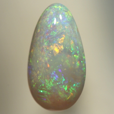 SOLID SEMI BLACK OPAL 3 D play of colour with sparkles of orange and green